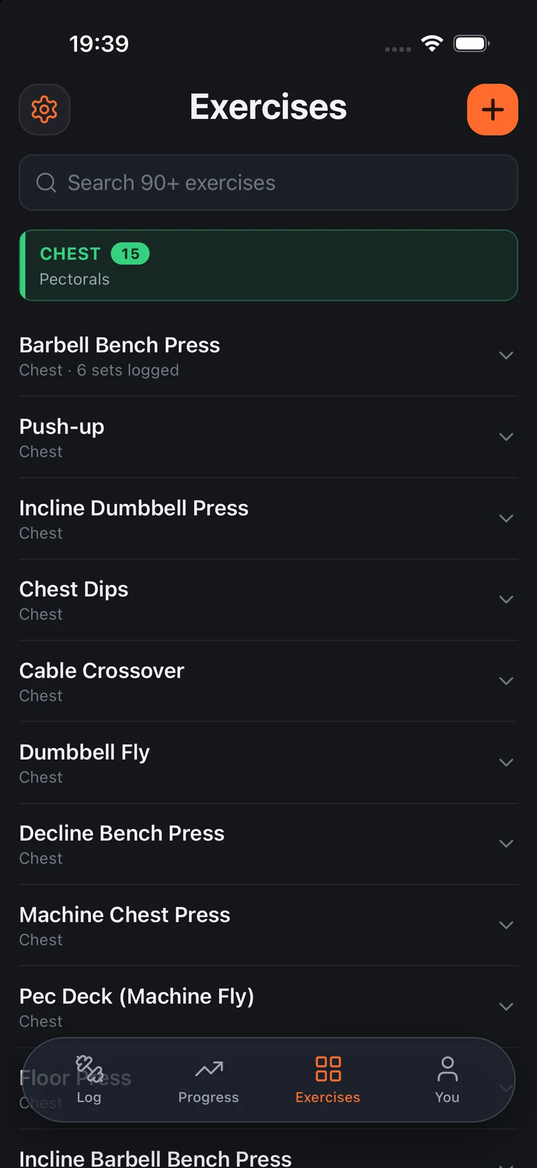 The Exercises screen: a searchable list of ninety movements grouped by body part, starting with the Chest group.